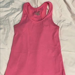 Bright neon pink under armour tank
